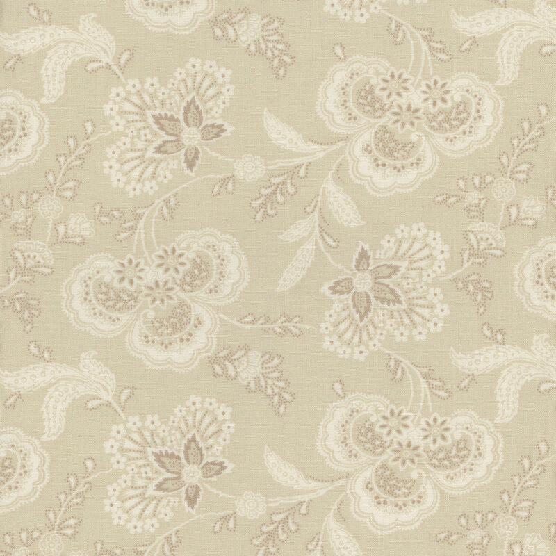 Tonal cream fabric featuring a paisley floral design