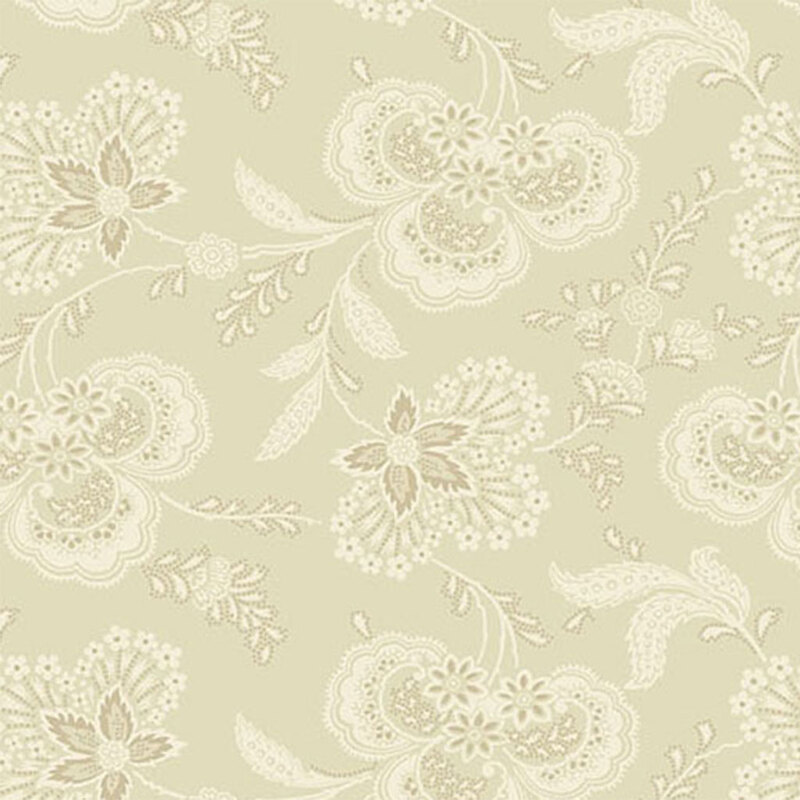 Tonal cream fabric featuring a paisley floral design