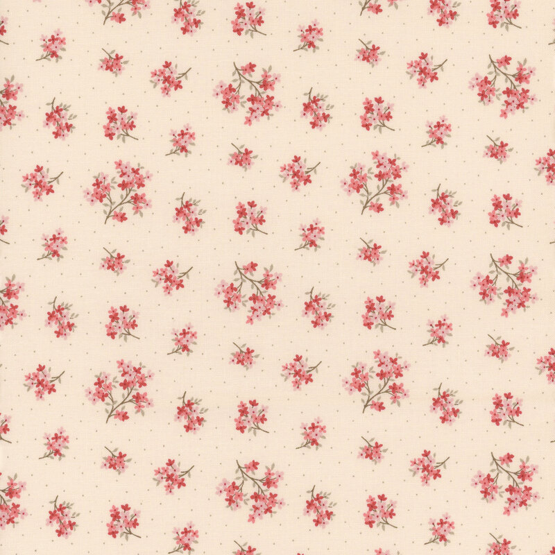 Cream fabric featuring a pattern of floral clusters