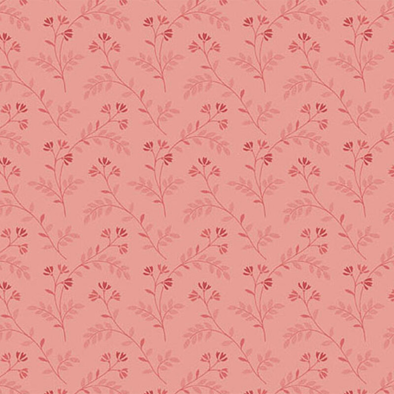 Tonal pink fabric featuring a pattern of delicate florals