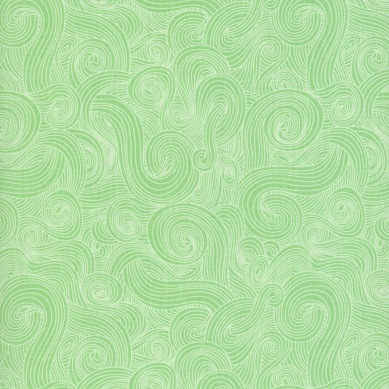 Mint green fabric with light outlined swirls.