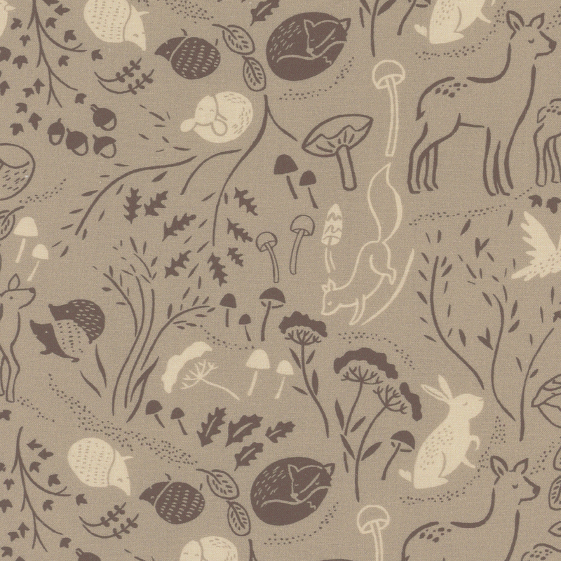 Taupe fabric with scattered forest animals like deer, hedgehogs, foxes, and rabbits amongst trees, leaves, and mushrooms.