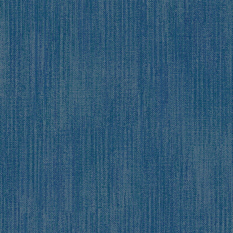 Denim blue fabric with a grunge texturing throughout