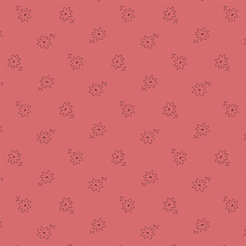 A rose pink fabric with a ditsy flower pattern