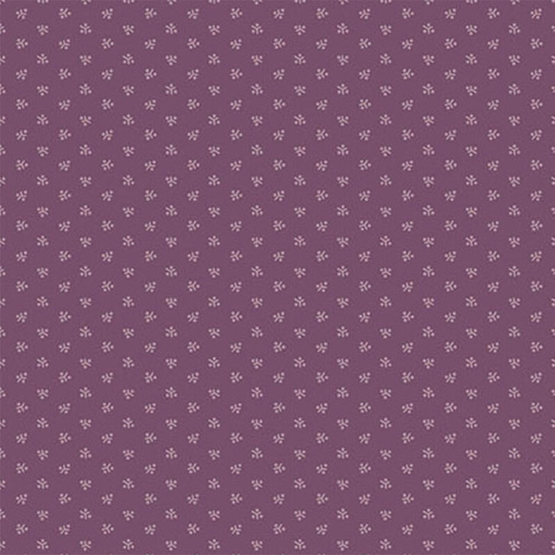 A purple fabric with a repeating pattern of tonal tokens.