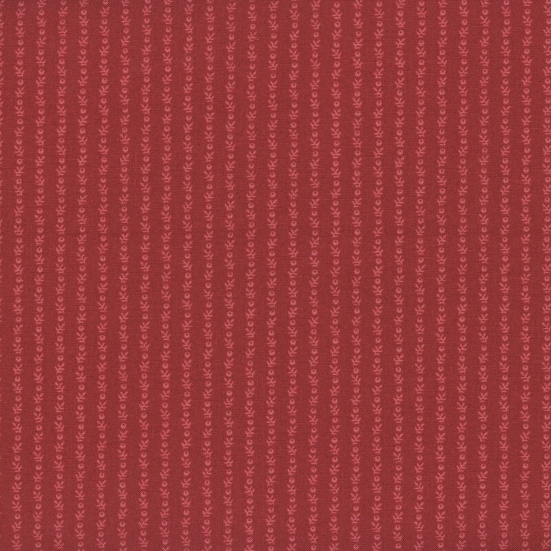 Poppy red fabric with tonal stripes of sprigs and berries