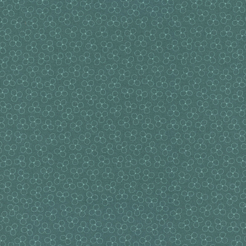 Teal fabric with a trefoil pattern