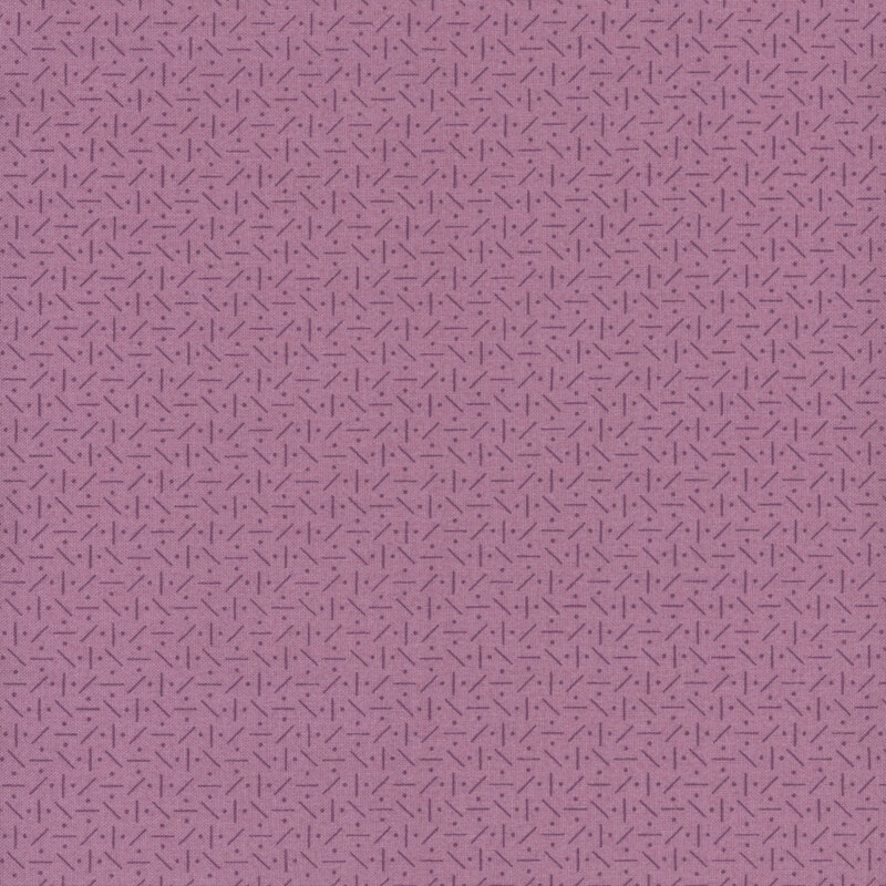 A lavender fabric featuring a tonal scatter pattern.