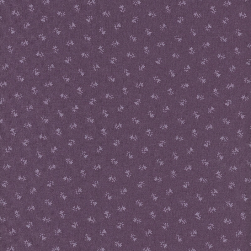 A fabric pattern featuring small, scattered floral designs on a dark purple background.