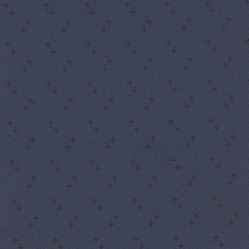 Repeating pattern of small dark dots, and floral designs on a navy blue background.