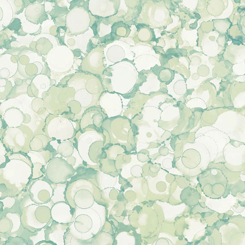 Green and cream watercolor blobs featuring overlapping circles and soft textures throughout