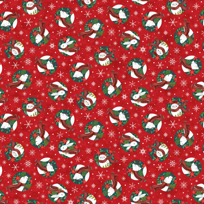 Red fabric featuring snowmen, rabbits, and wreaths on a snowflake background.