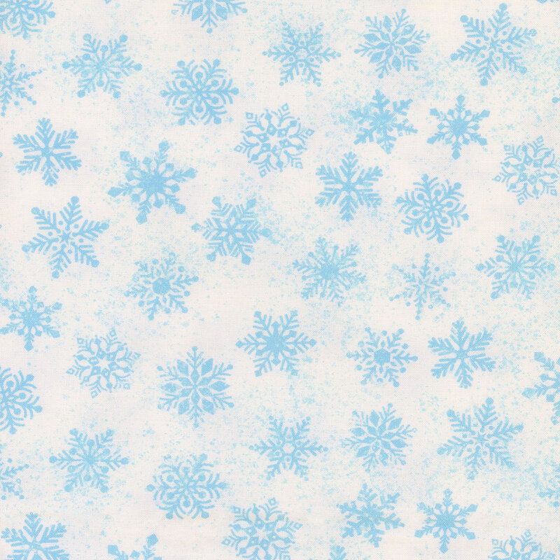 Light blue snowflakes scattered across a white fabric background.