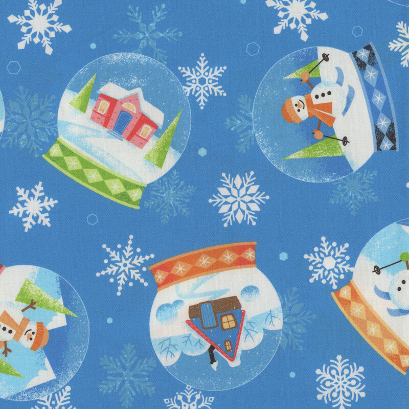 Blue fabric featuring snowmen in various poses inside of snowglobes, with scattered snowflakes between.