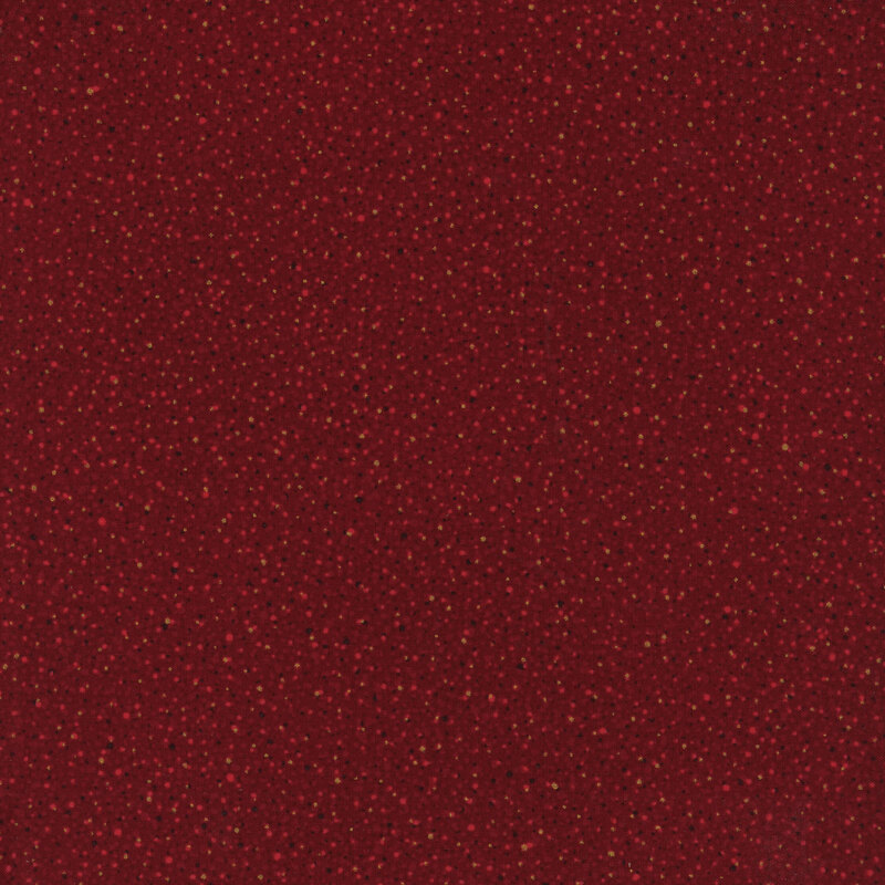 Mottled red fabric with pinprick dots and dotted metallic accents.