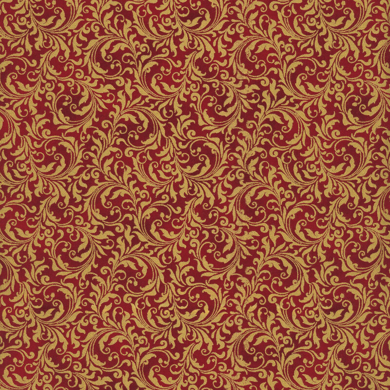 Red fabric with an intricate filigree pattern and metallic gold accents.