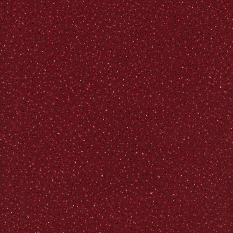 Mottled red fabric with pinprick dots and dotted metallic accents.