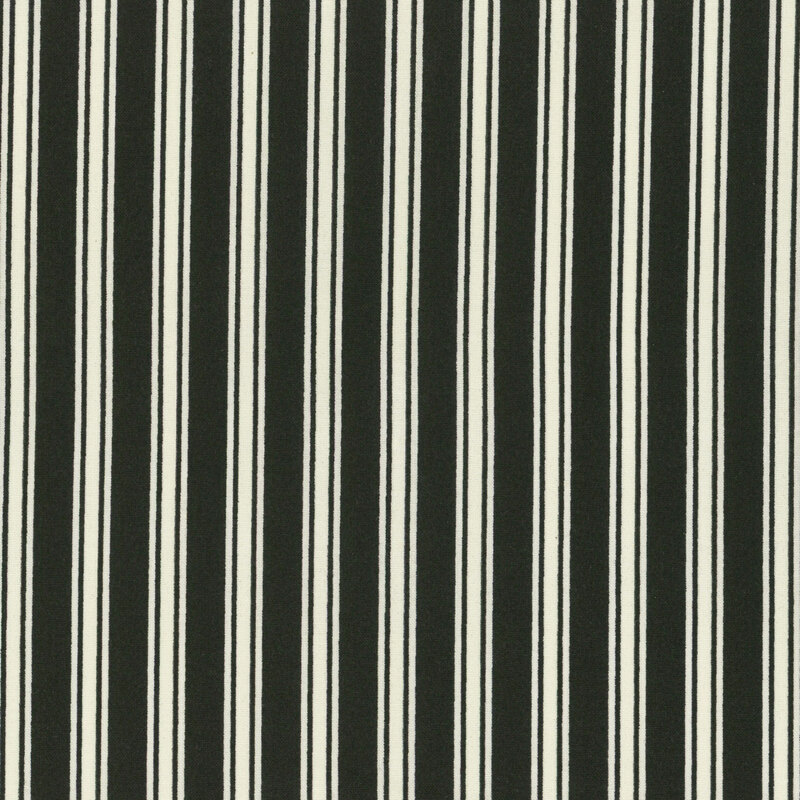 Black and white vertical stripes in a repeating pattern.