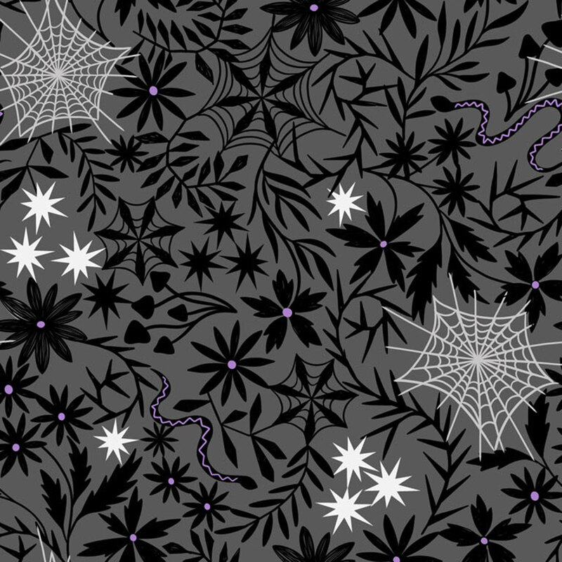 A gray patterned fabric featuring white spiderwebs and various flowers and leaves.