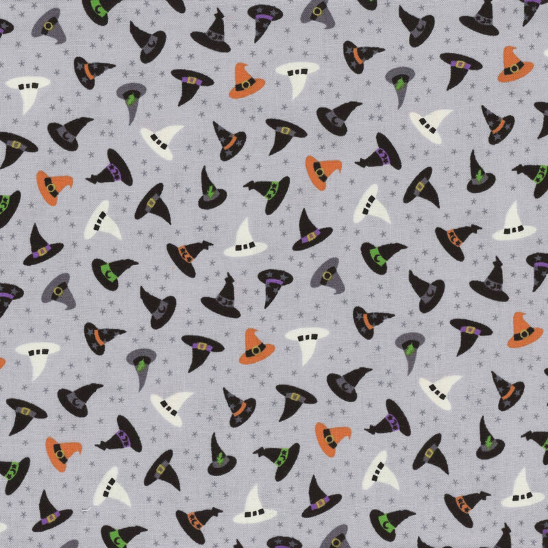 Various witch hats in black, orange, white, and purple on a gray background with tiny stars.
