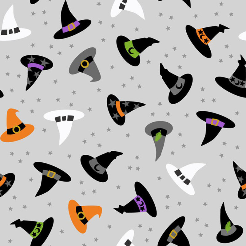 Various witch hats in black, orange, white, and purple on a gray background with tiny stars.