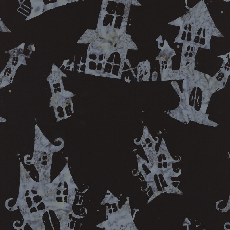 Pattern of whimsical, ghostly white houses on a black background, evoking a spooky aesthetic.