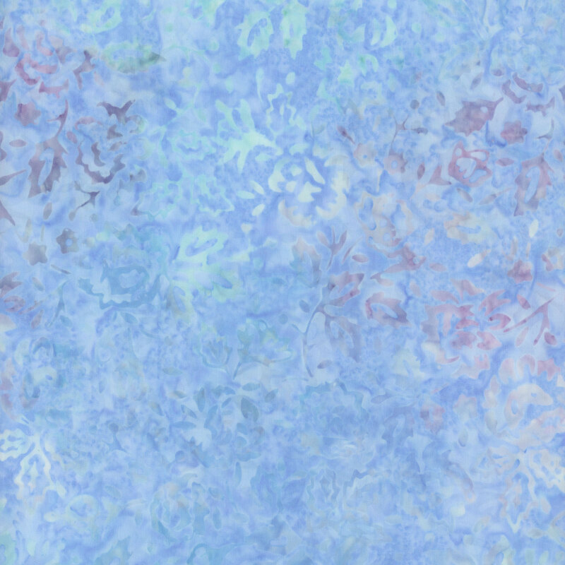 Batik pattern featuring soft shades of blue, with hints of purple and green floral designs.