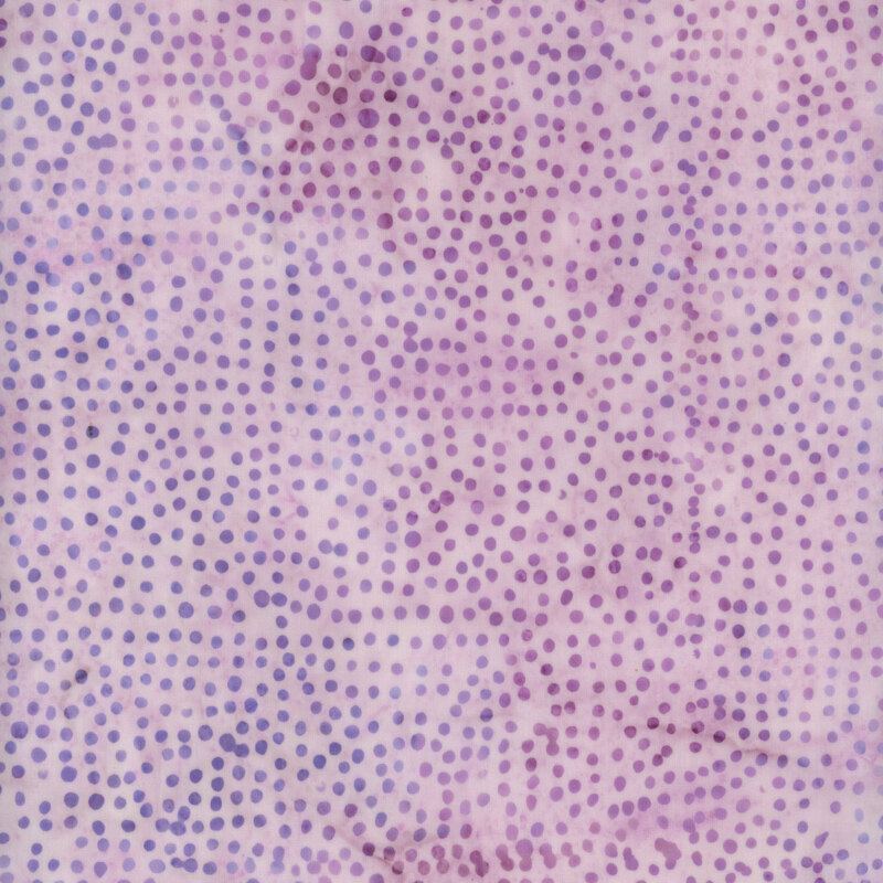 Abstract pattern of purple and lavender dots on a soft, textured background.