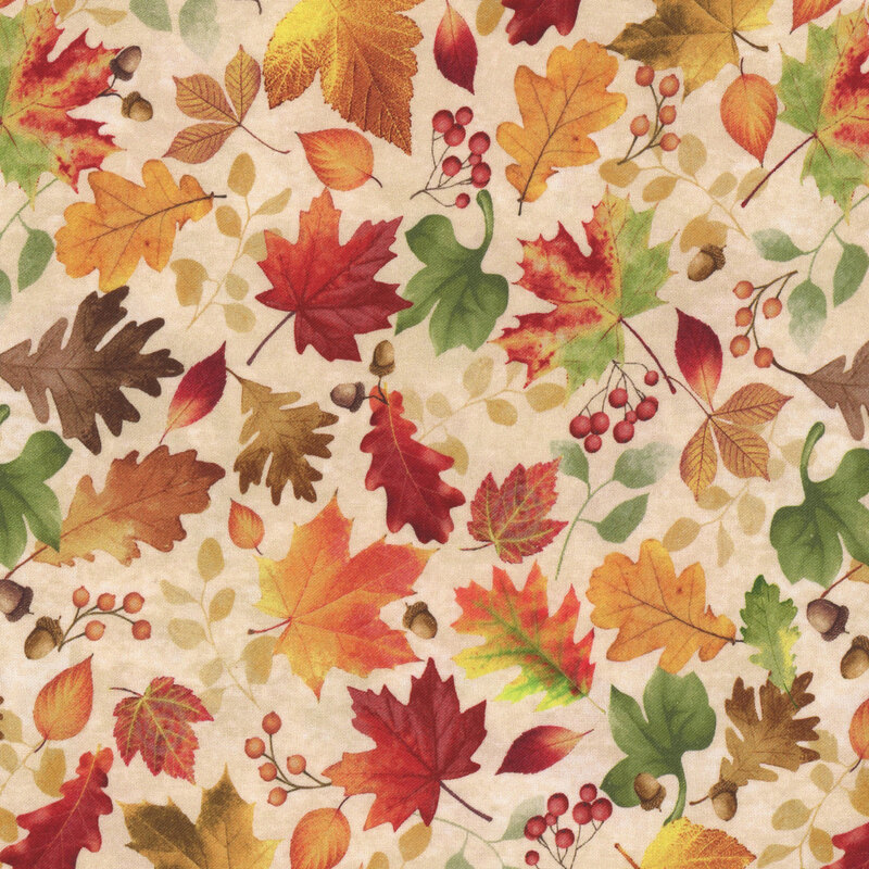 Cream fabric with colorful tossed autumn leaves in red, orange, green, brown, and tonal cream.