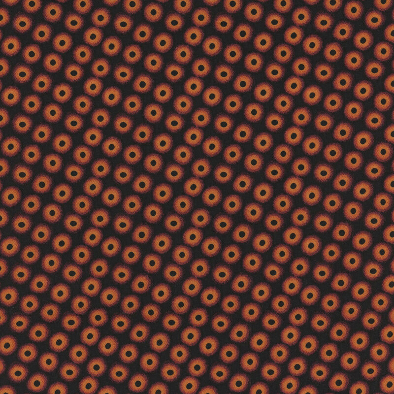 Repeating pattern of circular shapes with orange and black colors on a dark background.