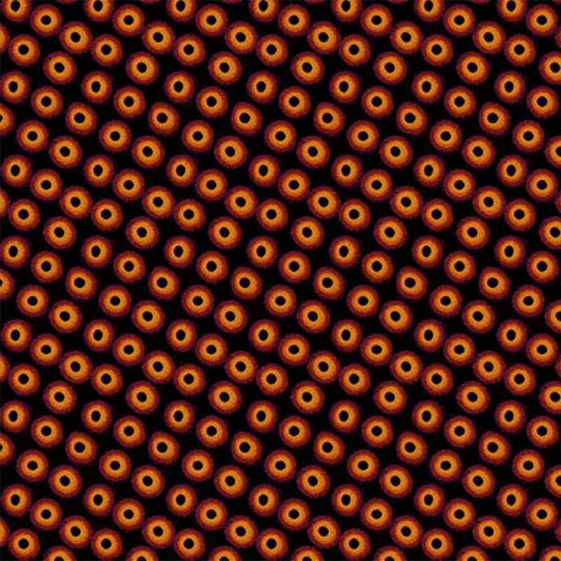 Repeating pattern of circular shapes with orange and black colors on a dark background.