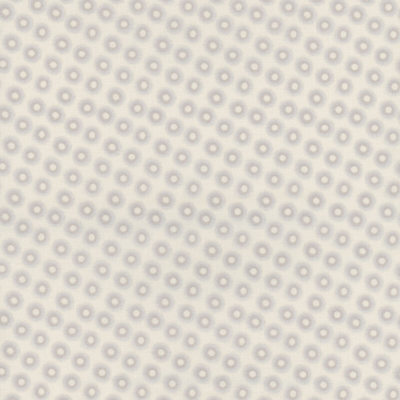 Repeating pattern of circular shapes with gray and white colors on a white background.
