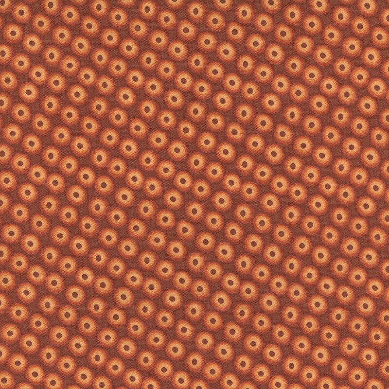 Repeating pattern of circular shapes with orange and peach colors on a orange background.