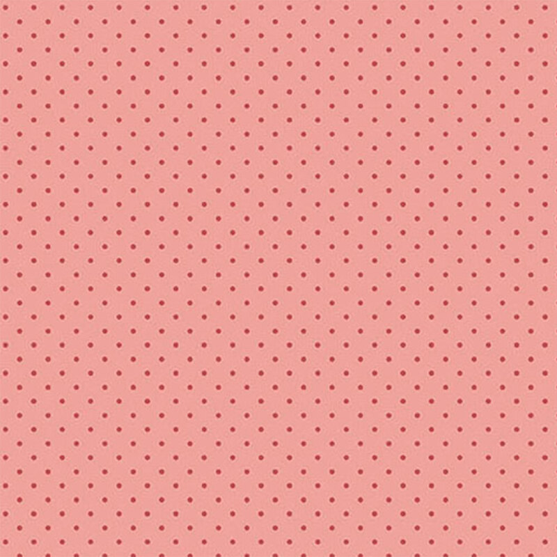 A pink fabric with evenly spaced dark pink polka dots.