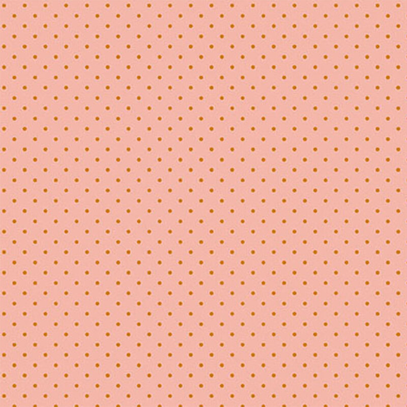 A light pink fabric with evenly spaced, small orange dots.