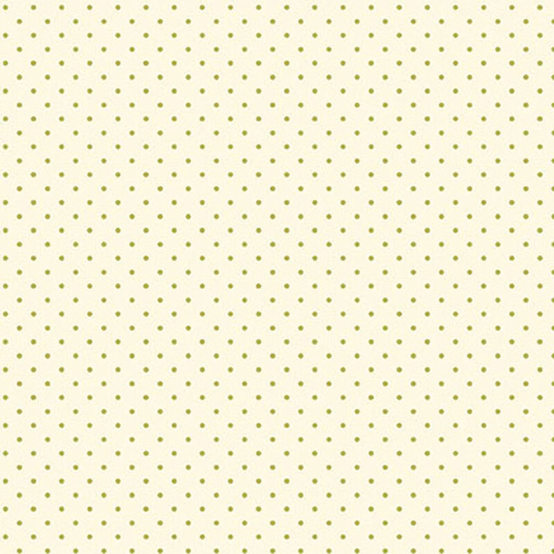 Cream fabric with a repeating pattern of small green dots.