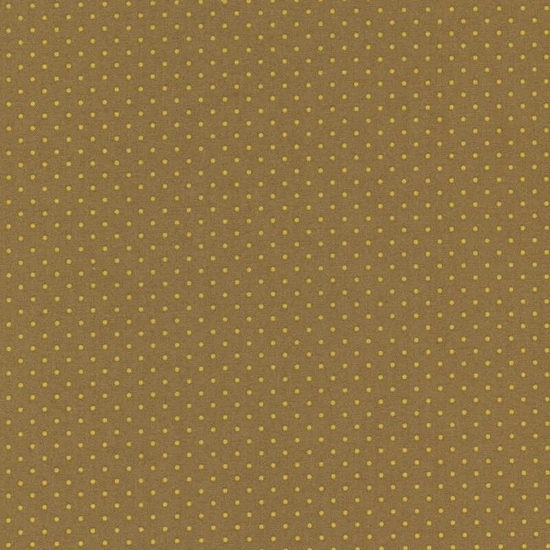 Brown fabric with a repeating pattern of small yellow dots.