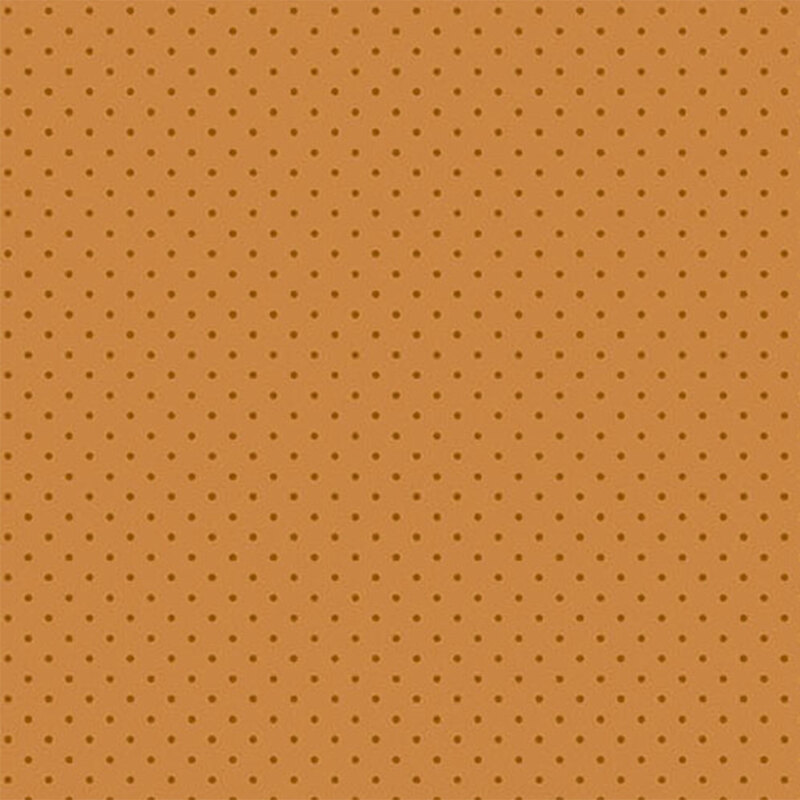 An orange fabric with evenly spaced small brown dots.