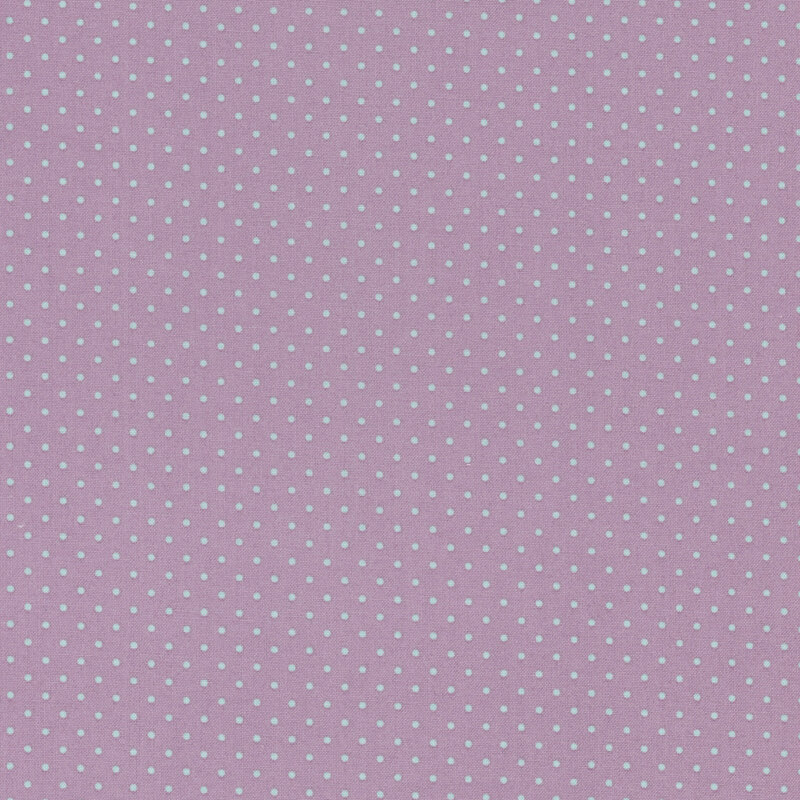 tiny light blue polka dots on a purple background