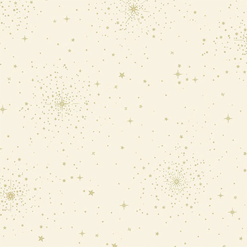 Light cream fabric scattered with gold stars and sparkles of various sizes.