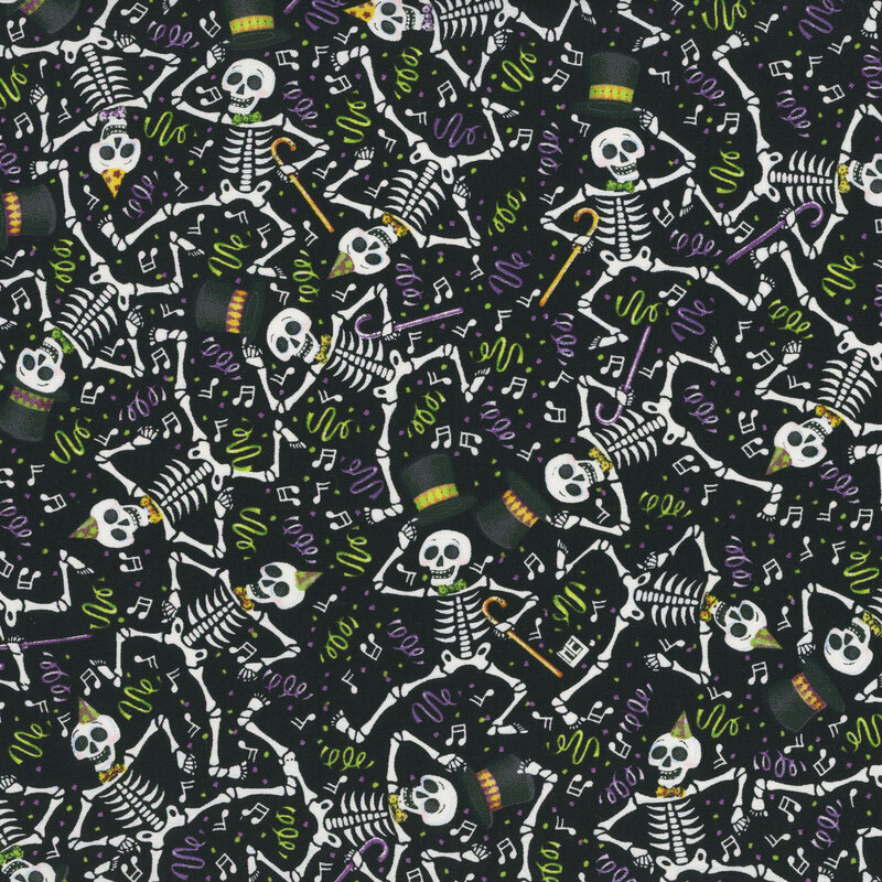 Black fabric with a packed design of dancing skeletons and colorful confetti and music notes scattered across the background.