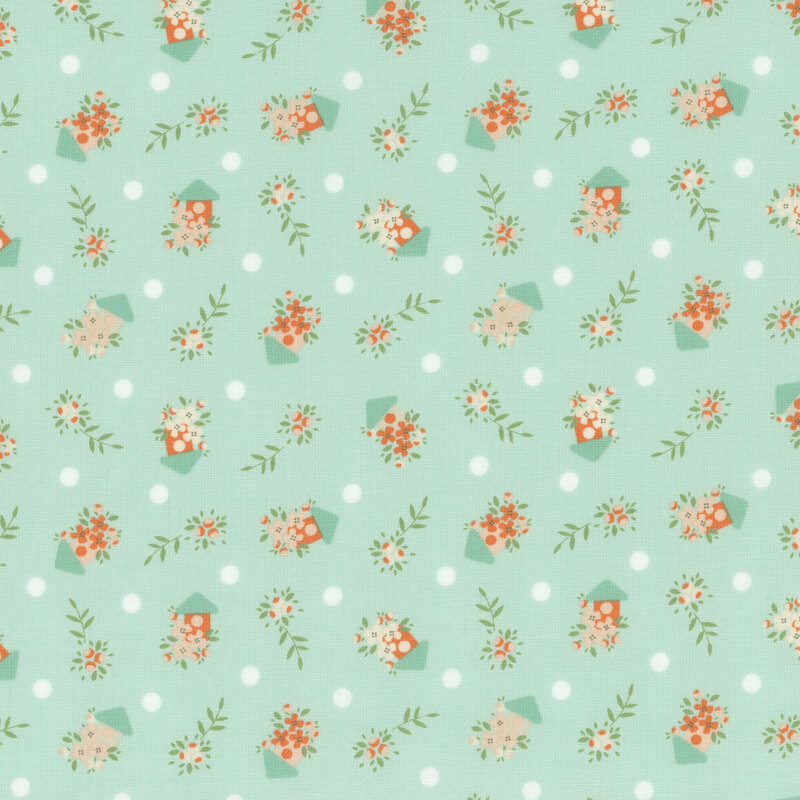 Mint green fabric with a scattered floral and polka dot pattern in red, white, and green.