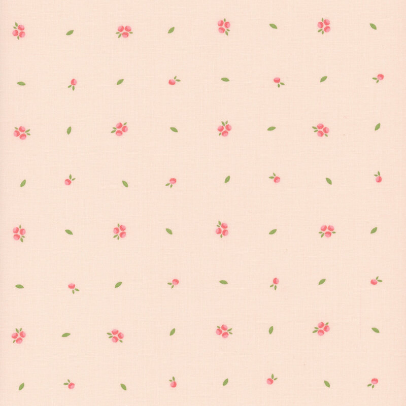 Pale pink fabric with a scattered pattern of small pink flowers and green leaves.