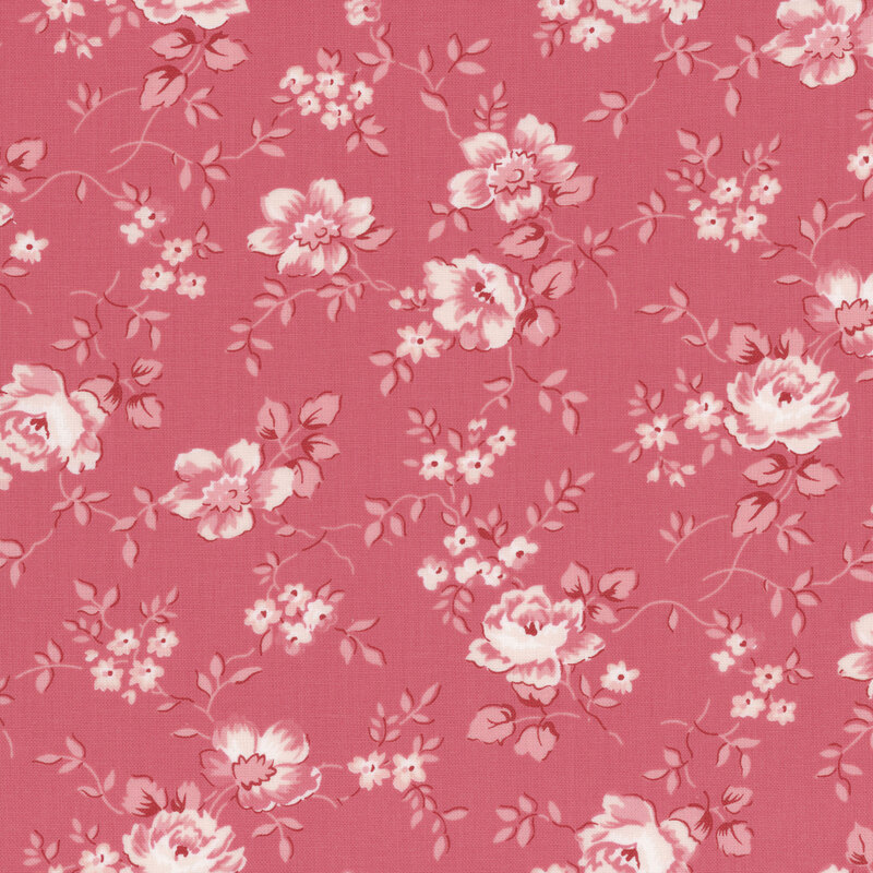 A pink floral fabric pattern featuring large, pale pink roses and small blossoms.