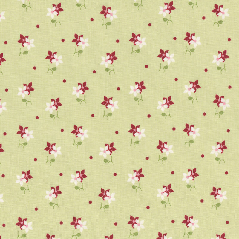 A light green fabric pattern featuring clusters of red and white flowers with small red dots.