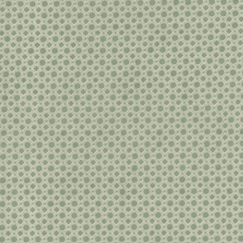 Light green fabric featuring a connected repeating pattern of small circles.