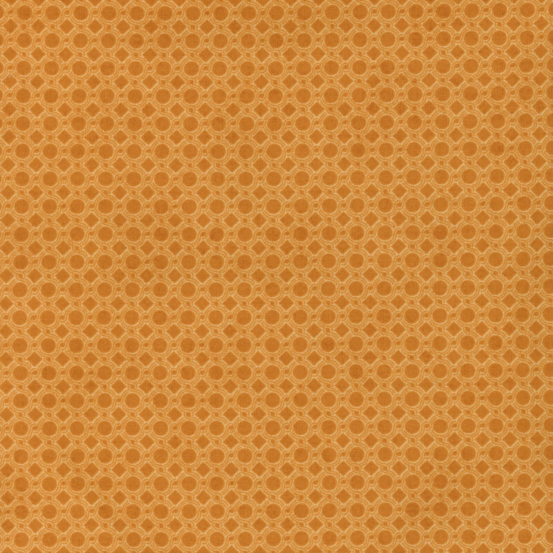 Orange fabric featuring a connected repeating pattern of small circles.