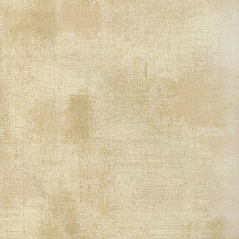 Cream mottled and grungy-textured fabric.