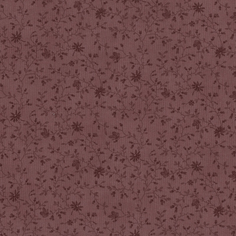 Floral pattern featuring small dark brown flowers and vines on a brownish purple background.