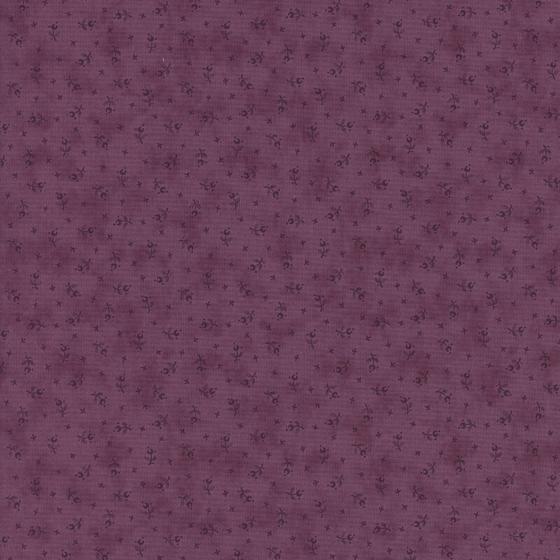 Plum fabric featuring a pattern of small floral motifs